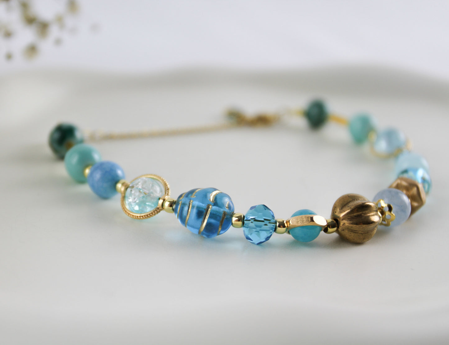 Blue bracelet with crystal stones and natural pearl