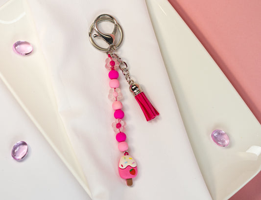 Happy Creamy Schlüsselanhänger - Perlen, Charm & Quaste
