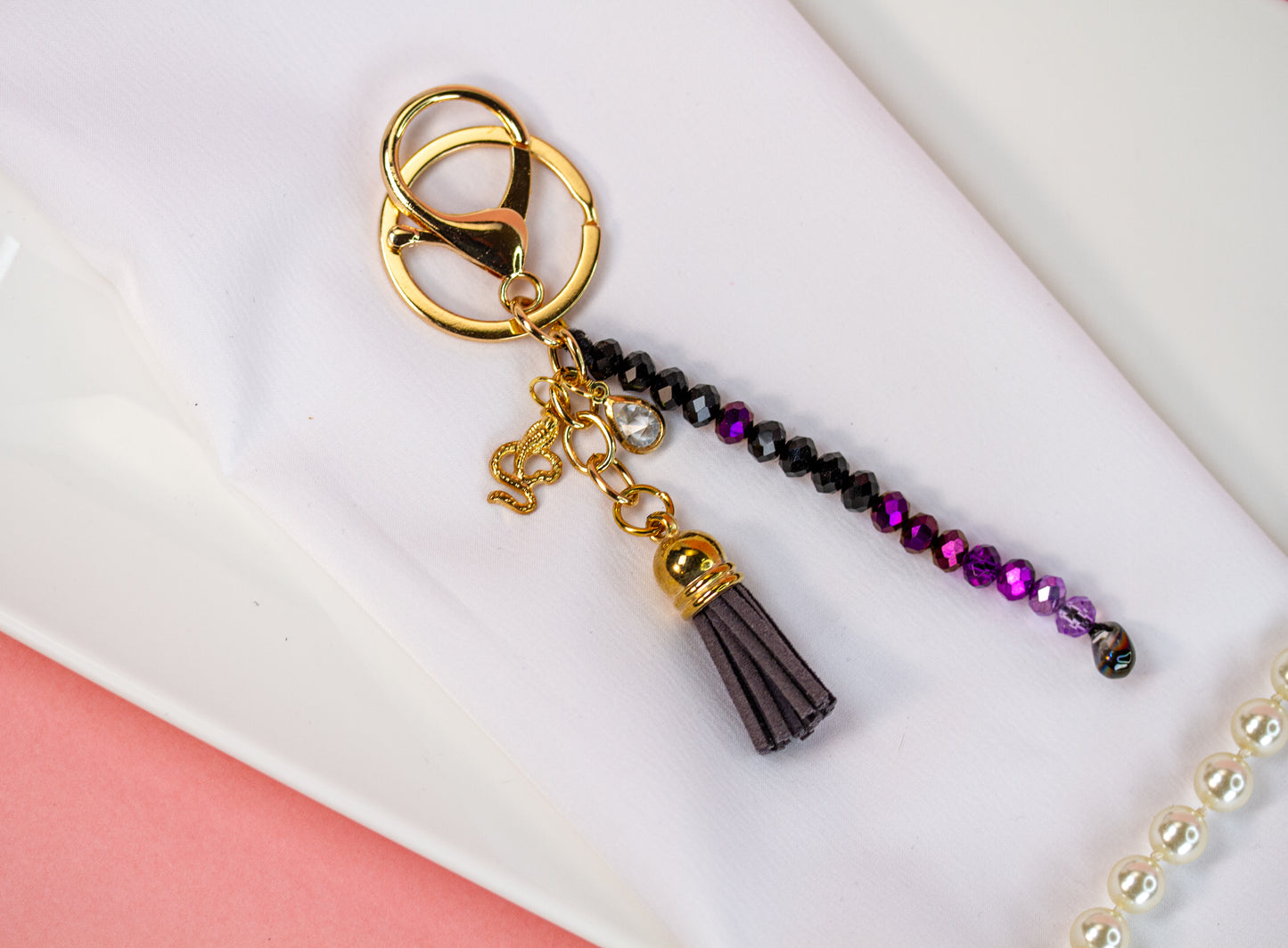 Perlen-Schlüsselanhänger Lila-Schwarz - Nymera