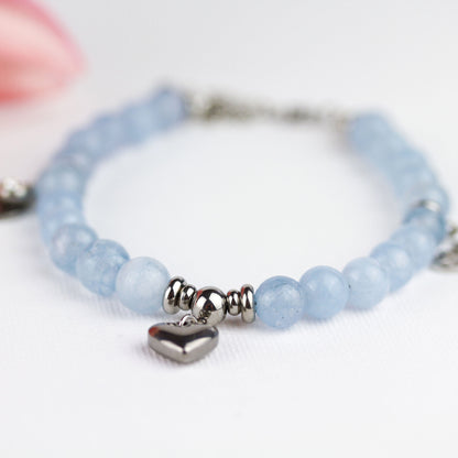 Aqua Clear Bloom – Aquamarin Naturstein-Armband mit silbernen Herz- & Lotusanhängern
