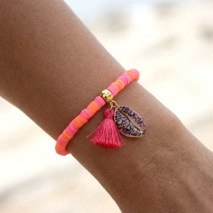 Wild Tropic – Neon-Katsuki-Armband mit Kauri-Muschel und Quaste