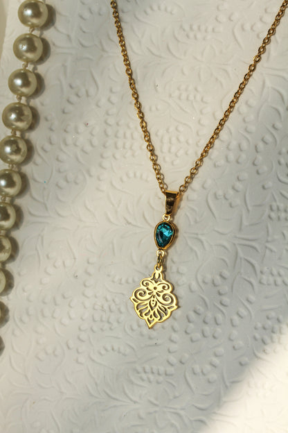 Aegina Crystal Set – Goldfarbener Schmuck mit blaugrünem Kristall
