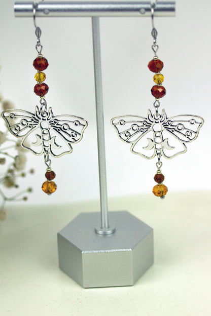 Silver Butterfly Ohrringe mit gelb-braunen Kristallperlen – Amberwing Kollektion