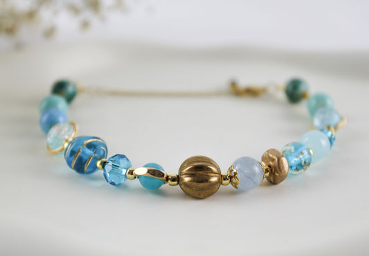 Blue bracelet with crystal stones and natural pearl