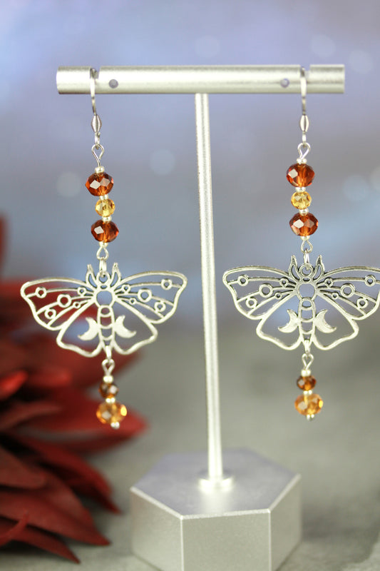 Silver Butterfly Ohrringe mit gelb-braunen Kristallperlen – Amberwing Kollektion