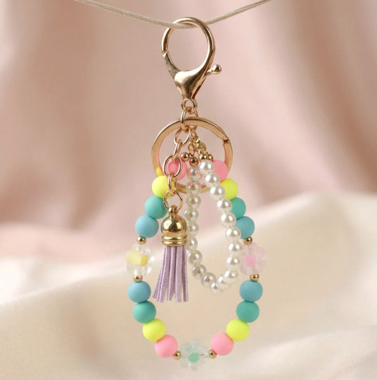 Happy – Bunter handgefertigter Perlen-Schlüsselanhänger mit Quaste