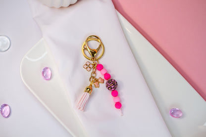 Happy Pink Leo Schlüsselanhänger - Perlen & Quaste