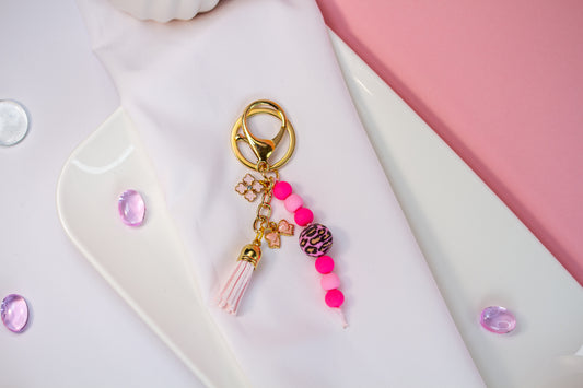 Happy Pink Leo Schlüsselanhänger - Perlen & Quaste